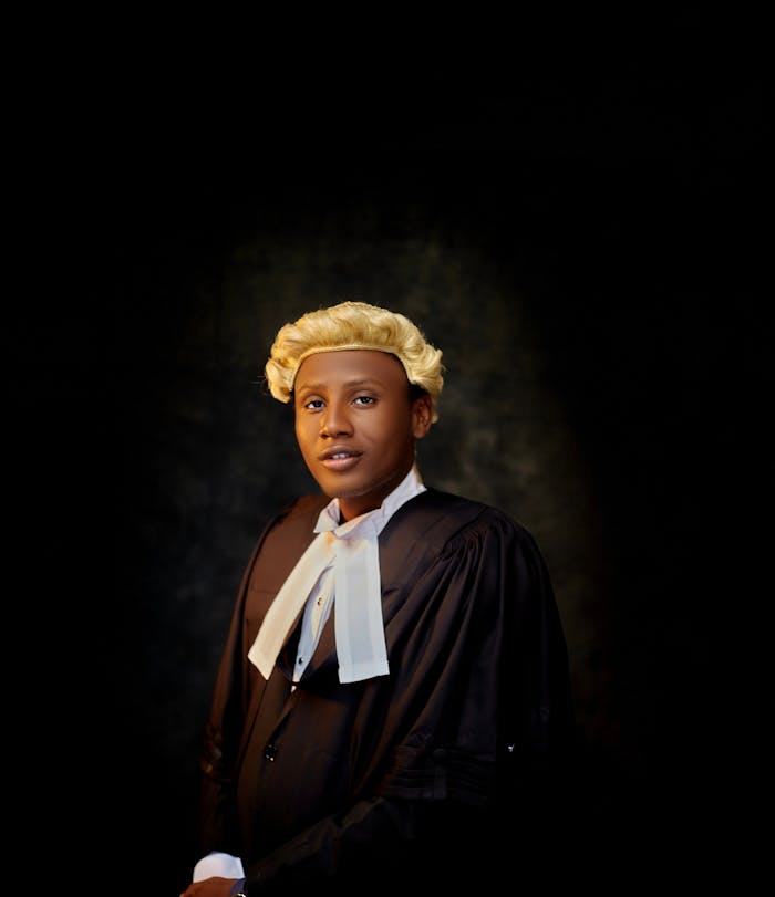 Mastering the First Impression: Your intriguing post title goes here Portrait of a young professional in legal attire with a classic look.